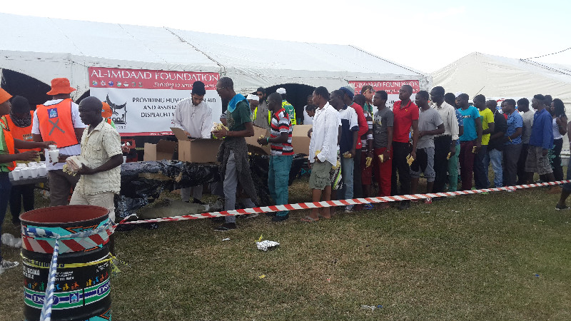 Breakfast distributions can take up to two hours to cater for the camps swelling population